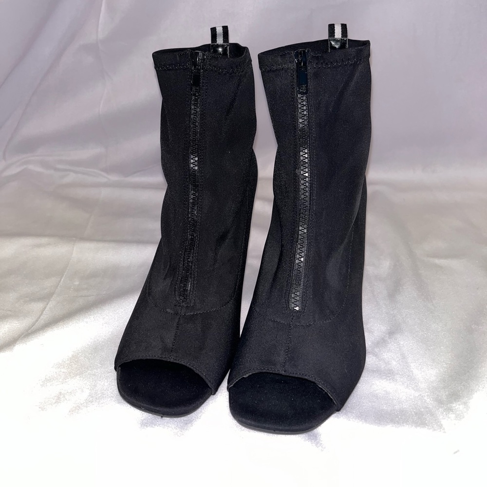 Black with white stripe and zip up 8.5 heel